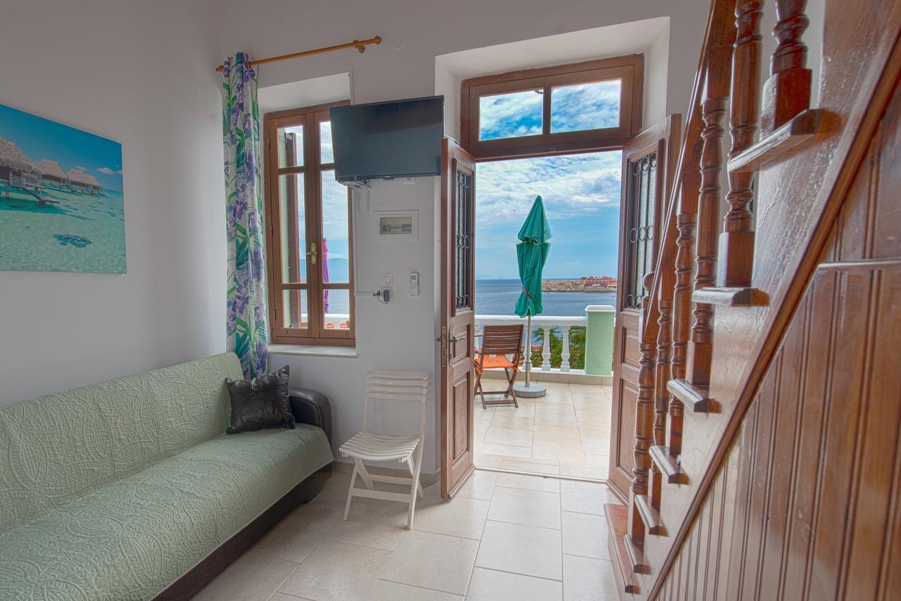 Roulas Apartments Chalki Town Exterior foto